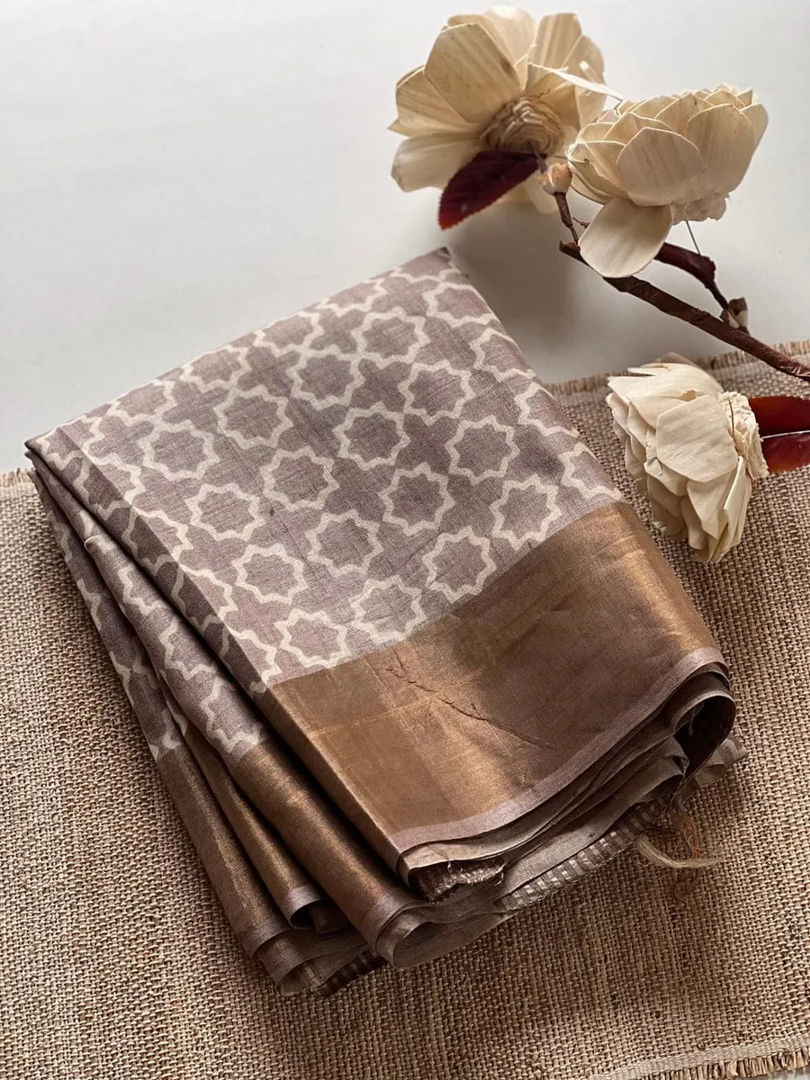 Pure handloom tussar silk zari border with floral print with silk mark tag